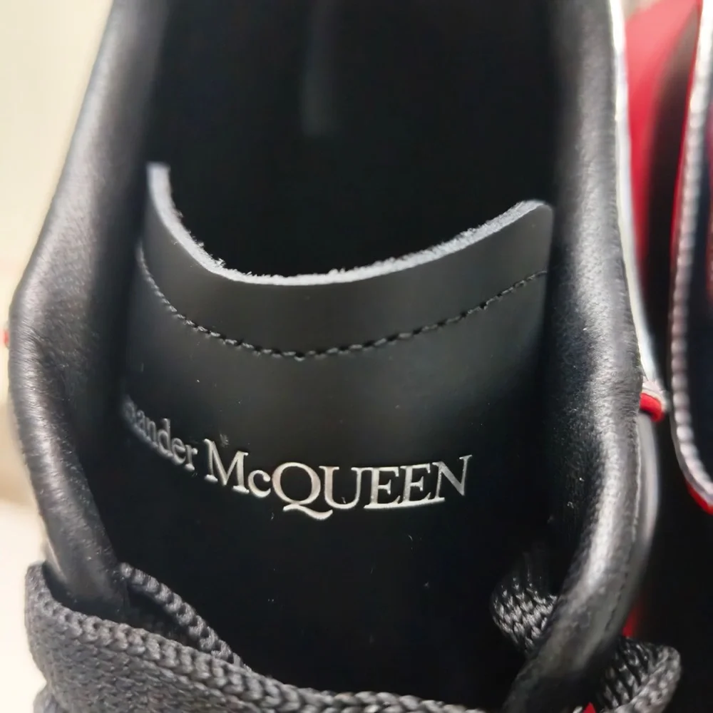 Alexander McQueen Black Leather Sneakers with Red Soles